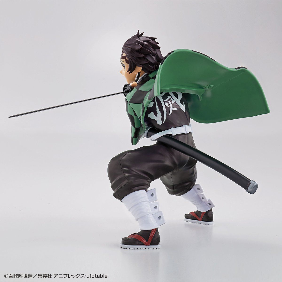 Demon Slayer - Kamado Tanjiro - Kimetsu no Yaiba Model Kit (Bandai), Non-articulated model of Tanjiro wielding Nichirin sword, includes face parts using "insert molding" technique, pre-painted haori part, Nichirin sword, stickers, and instruction manual. Franchise: Demon Slayer, Brand: Bandai, Release Date: 2020-12-19, Type: Model Kit. Sold at Nippon Figures.