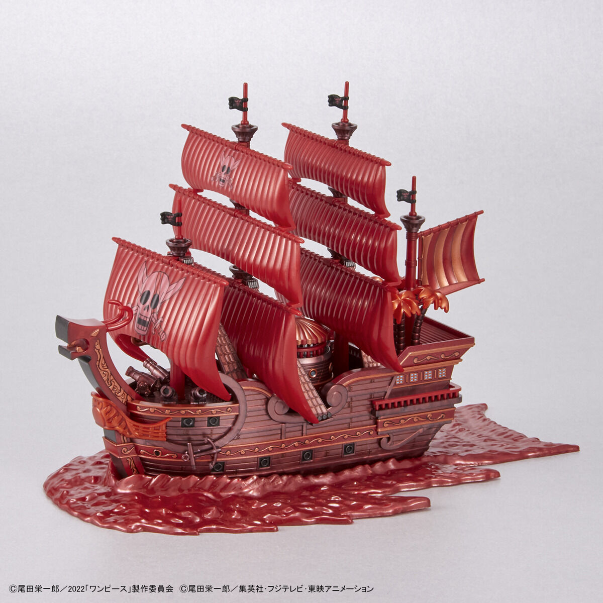 One Piece - Red Force - RED FILM Special - Grand Ship Collection Model Kit (Bandai), Metallic red color scheme inspired by the movie "ONE PIECE FILM RED", character plates of the Red Hair Pirates included, display base and ocean wave effects for added realism, foil and marking stickers included, released by Nippon Figures