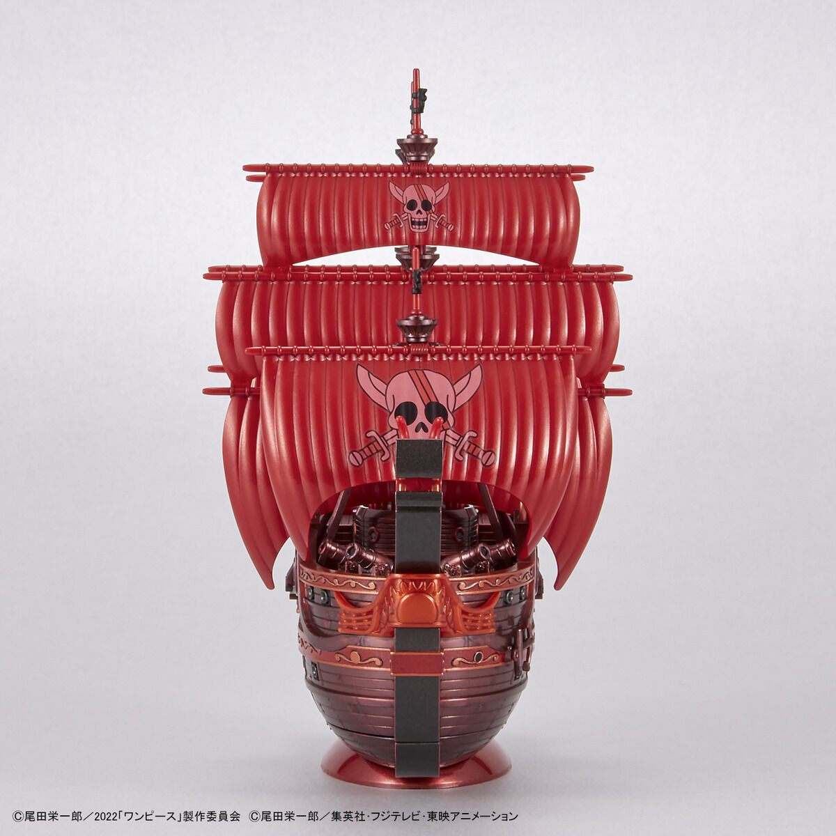 One Piece - Red Force - RED FILM Special - Grand Ship Collection Model Kit (Bandai), Metallic red color scheme inspired by the movie "ONE PIECE FILM RED", character plates of the Red Hair Pirates included, display base and ocean wave effects for added realism, foil and marking stickers included, released by Nippon Figures