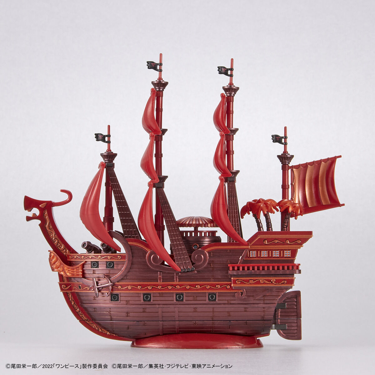 One Piece - Red Force - RED FILM Special - Grand Ship Collection Model Kit (Bandai), Metallic red color scheme inspired by the movie "ONE PIECE FILM RED", character plates of the Red Hair Pirates included, display base and ocean wave effects for added realism, foil and marking stickers included, released by Nippon Figures