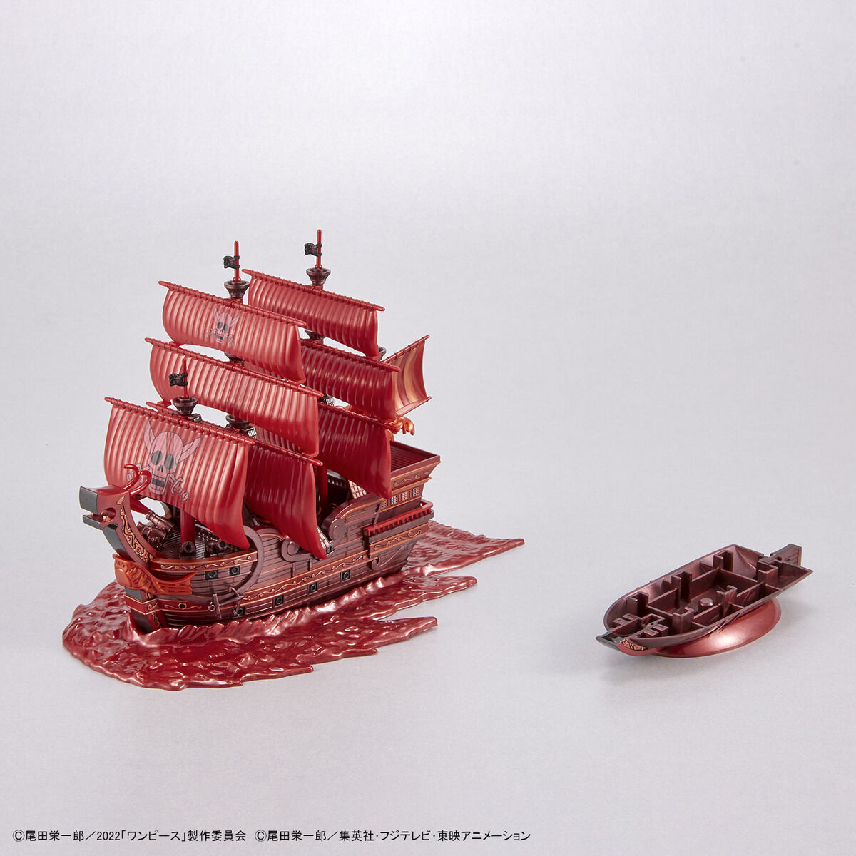 One Piece - Red Force - RED FILM Special - Grand Ship Collection Model Kit (Bandai), Metallic red color scheme inspired by the movie "ONE PIECE FILM RED", character plates of the Red Hair Pirates included, display base and ocean wave effects for added realism, foil and marking stickers included, released by Nippon Figures