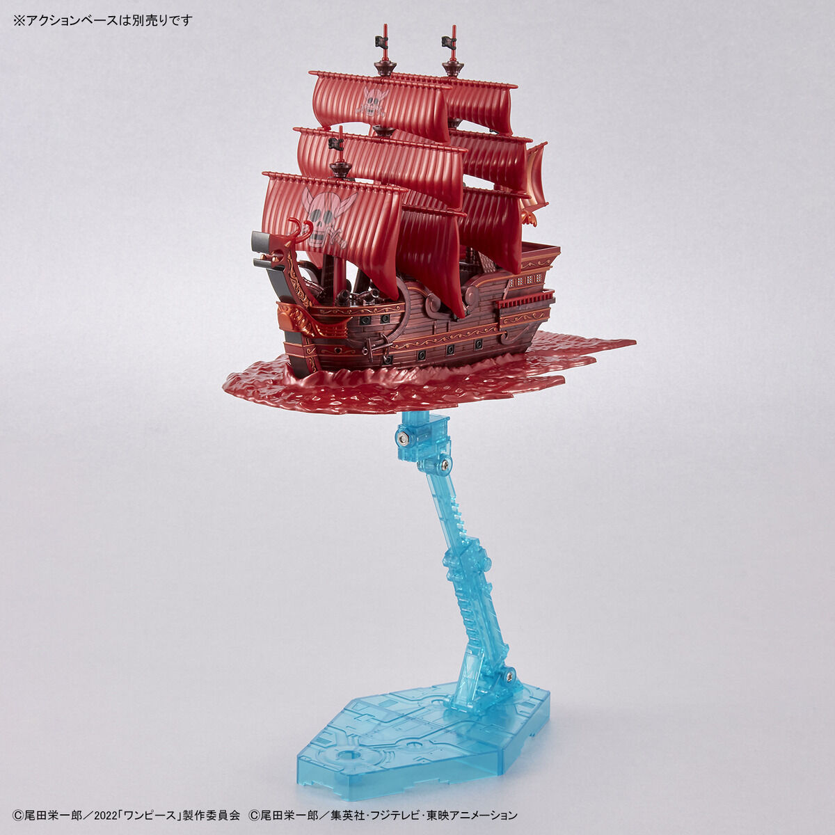 One Piece - Red Force - RED FILM Special - Grand Ship Collection Model Kit (Bandai), Metallic red color scheme inspired by the movie "ONE PIECE FILM RED", character plates of the Red Hair Pirates included, display base and ocean wave effects for added realism, foil and marking stickers included, released by Nippon Figures