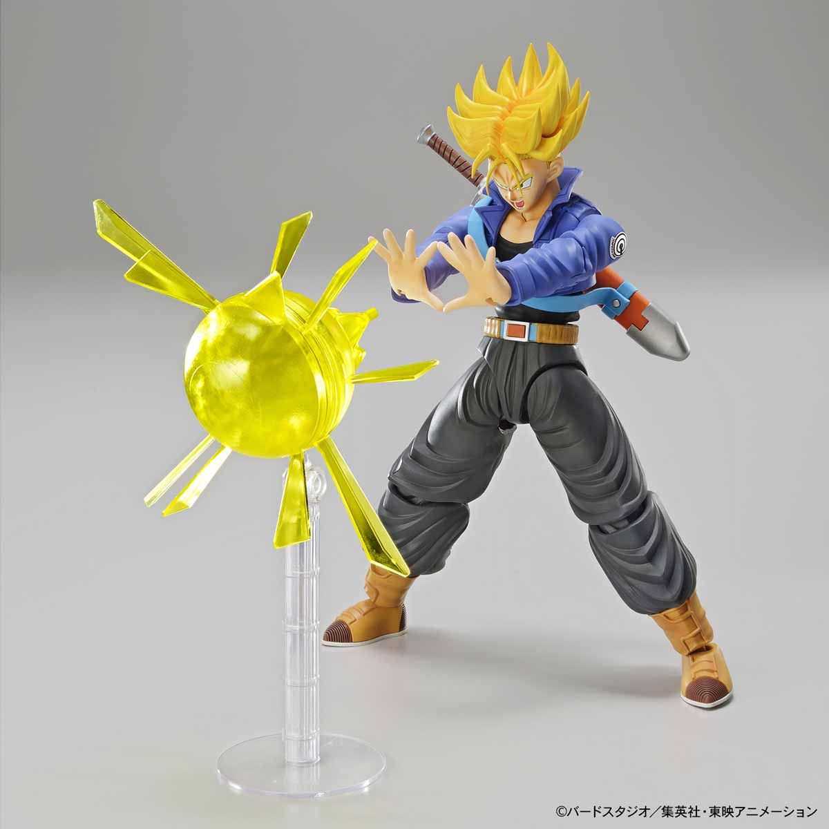 Dragon Ball - Super Saiyan Trunks - Figure-rise Standard Model Kit, Includes two head parts for Trunks in normal and Super Saiyan states, effect parts for Burning Attack and Shining Slash, iconic sword, and various hand parts. Compatible with Figure-rise Mechanics Trunks' Time Machine. From Bandai. Available at Nippon Figures.