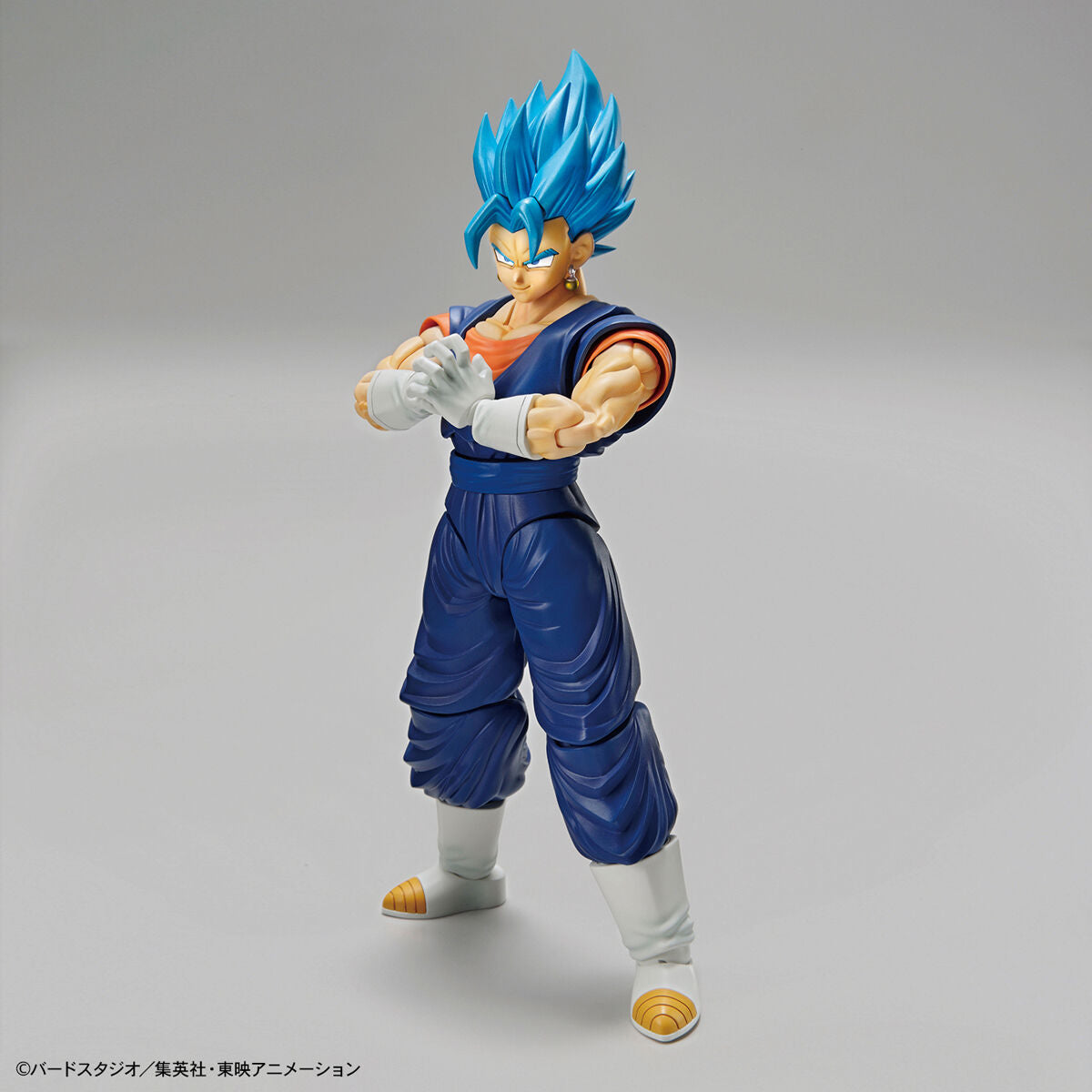 Dragon Ball - Super Saiyan God Vegito - Figure-rise Standard Model Kit, includes two facial expressions, seven interchangeable hand parts, and Vegito sword effect, sold by Nippon Figures.