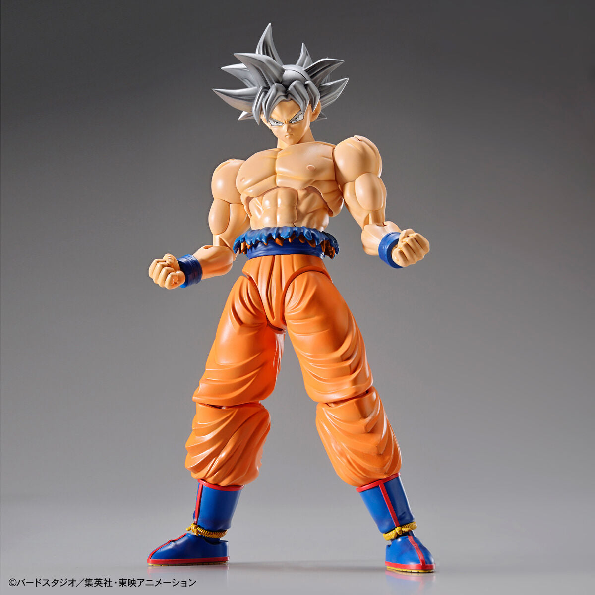 Dragon Ball - Ultra Instinct Goku - Figure-rise Standard Model Kit (Bandai), Featuring Son Goku in his ultimate form "Ultra Instinct" with torn gi, silver hair, and intense facial expressions, includes various parts for customization, from Nippon Figures
