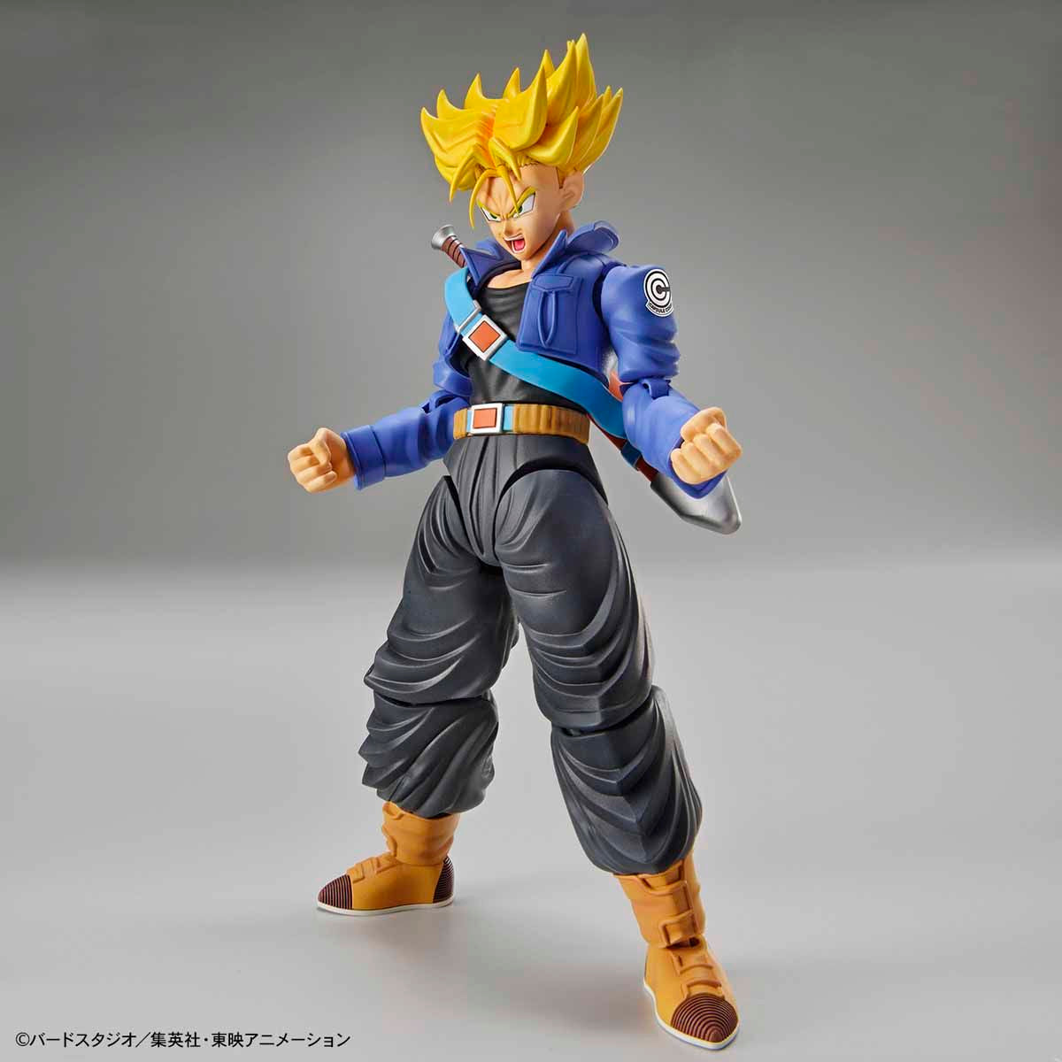 Dragon Ball - Super Saiyan Trunks - Figure-rise Standard Model Kit, Includes two head parts for Trunks in normal and Super Saiyan states, effect parts for Burning Attack and Shining Slash, iconic sword, and various hand parts. Compatible with Figure-rise Mechanics Trunks' Time Machine. From Bandai. Available at Nippon Figures.
