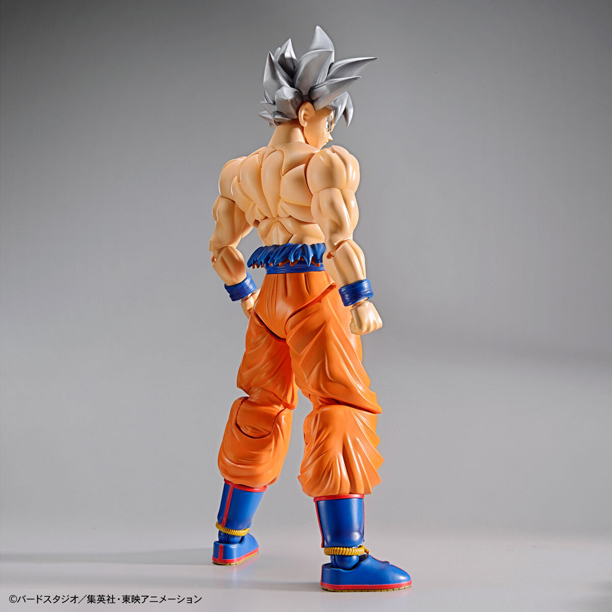 Dragon Ball - Ultra Instinct Goku - Figure-rise Standard Model Kit (Bandai), Featuring Son Goku in his ultimate form "Ultra Instinct" with torn gi, silver hair, and intense facial expressions, includes various parts for customization, from Nippon Figures