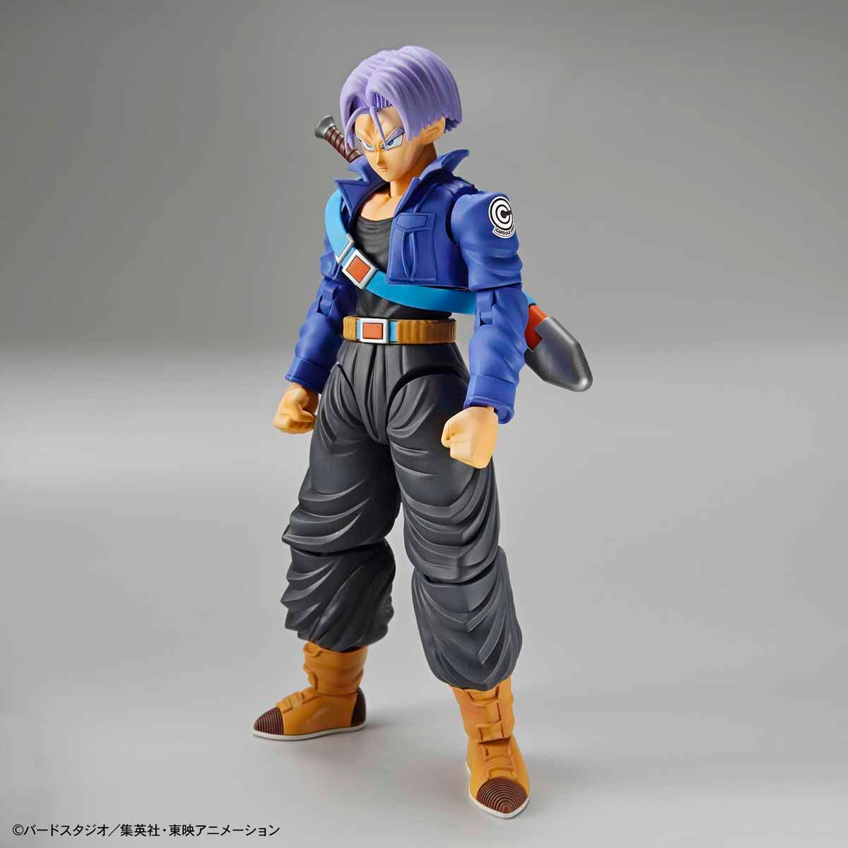 Dragon Ball - Super Saiyan Trunks - Figure-rise Standard Model Kit, Includes two head parts for Trunks in normal and Super Saiyan states, effect parts for Burning Attack and Shining Slash, iconic sword, and various hand parts. Compatible with Figure-rise Mechanics Trunks' Time Machine. From Bandai. Available at Nippon Figures.