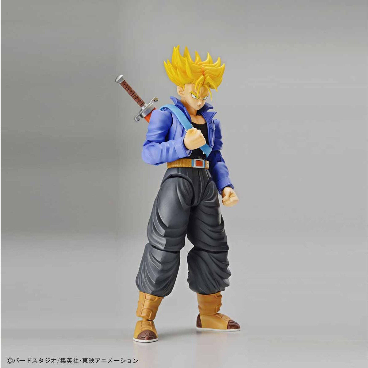 Dragon Ball - Super Saiyan Trunks - Figure-rise Standard Model Kit, Includes two head parts for Trunks in normal and Super Saiyan states, effect parts for Burning Attack and Shining Slash, iconic sword, and various hand parts. Compatible with Figure-rise Mechanics Trunks' Time Machine. From Bandai. Available at Nippon Figures.