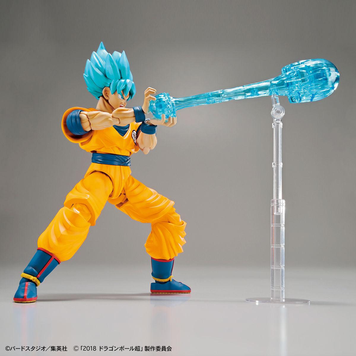 Dragon Ball - Super Saiyan God Son Goku (Special Color) - Figure-rise Standard Model Kit, Includes Special Attack Effects, Facial Expression Parts, Hand Parts, Effect Base, and Original Damage Expression Seal. Franchise: Dragon Ball, Brand: Bandai, Release Date: 2018-11-30. Store Name: Nippon Figures.
