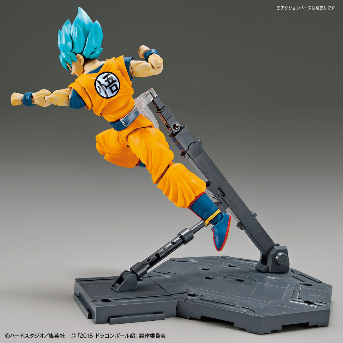 Dragon Ball - Super Saiyan God Son Goku (Special Color) - Figure-rise Standard Model Kit, Includes Special Attack Effects, Facial Expression Parts, Hand Parts, Effect Base, and Original Damage Expression Seal. Franchise: Dragon Ball, Brand: Bandai, Release Date: 2018-11-30. Store Name: Nippon Figures.