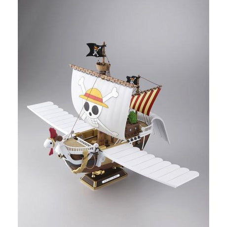 One Piece - The Flying Going Merry - Model Kit (Bandai), Non-scale plastic model kit measuring approximately 280mm in length, includes figures of Luffy, Zoro, Sanji, Usopp, Brook, Nami, Robin, and Chopper, released on 2011-07-01, sold at Nippon Figures.