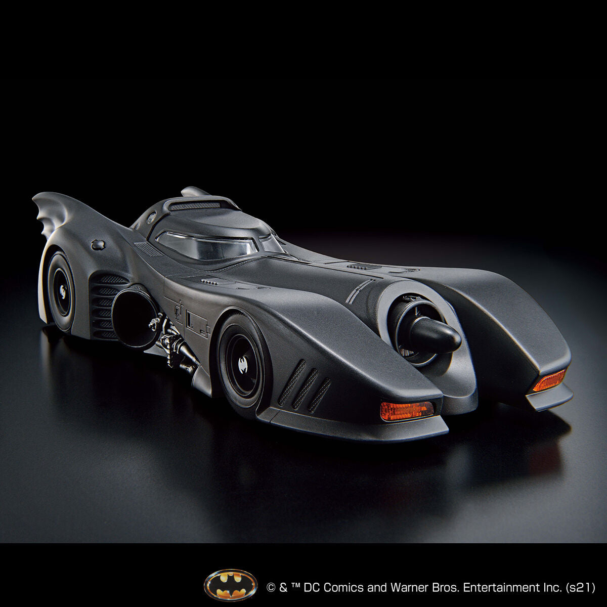Image alt text: Batman - 1/35 Scale Batmobile (Batman Ver.) - Model Kit, intricately sculpted parts, slideable roof section, meticulously reproduced cockpit interior and mechanical details, deployment of machine guns and rocket anchors, Nippon Figures.