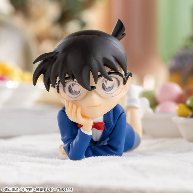 Detective Conan - Edogawa Conan - Premium Chokonose Figure (SEGA), featuring Conan in a cute, reclining pose with his chin resting on his hands, part of SEGA's Premium Chokonose lineup, dimensions approx. 4×6cm, release date 10.June 2024, available at Nippon Figures.