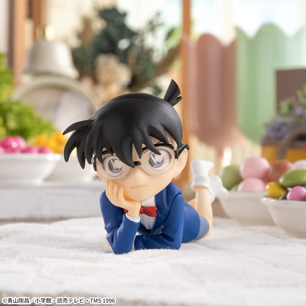 Detective Conan - Edogawa Conan - Premium Chokonose Figure (SEGA), featuring Conan in a cute, reclining pose with his chin resting on his hands, part of SEGA's Premium Chokonose lineup, dimensions approx. 4×6cm, release date 10.June 2024, available at Nippon Figures.