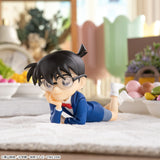 Detective Conan - Edogawa Conan - Premium Chokonose Figure (SEGA), featuring Conan in a cute, reclining pose with his chin resting on his hands, part of SEGA's Premium Chokonose lineup, dimensions approx. 4×6cm, release date 10.June 2024, available at Nippon Figures.