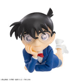 Detective Conan - Edogawa Conan - Premium Chokonose Figure (SEGA), featuring Conan in a cute, reclining pose with his chin resting on his hands, part of SEGA's Premium Chokonose lineup, dimensions approx. 4×6cm, release date 10.June 2024, available at Nippon Figures.