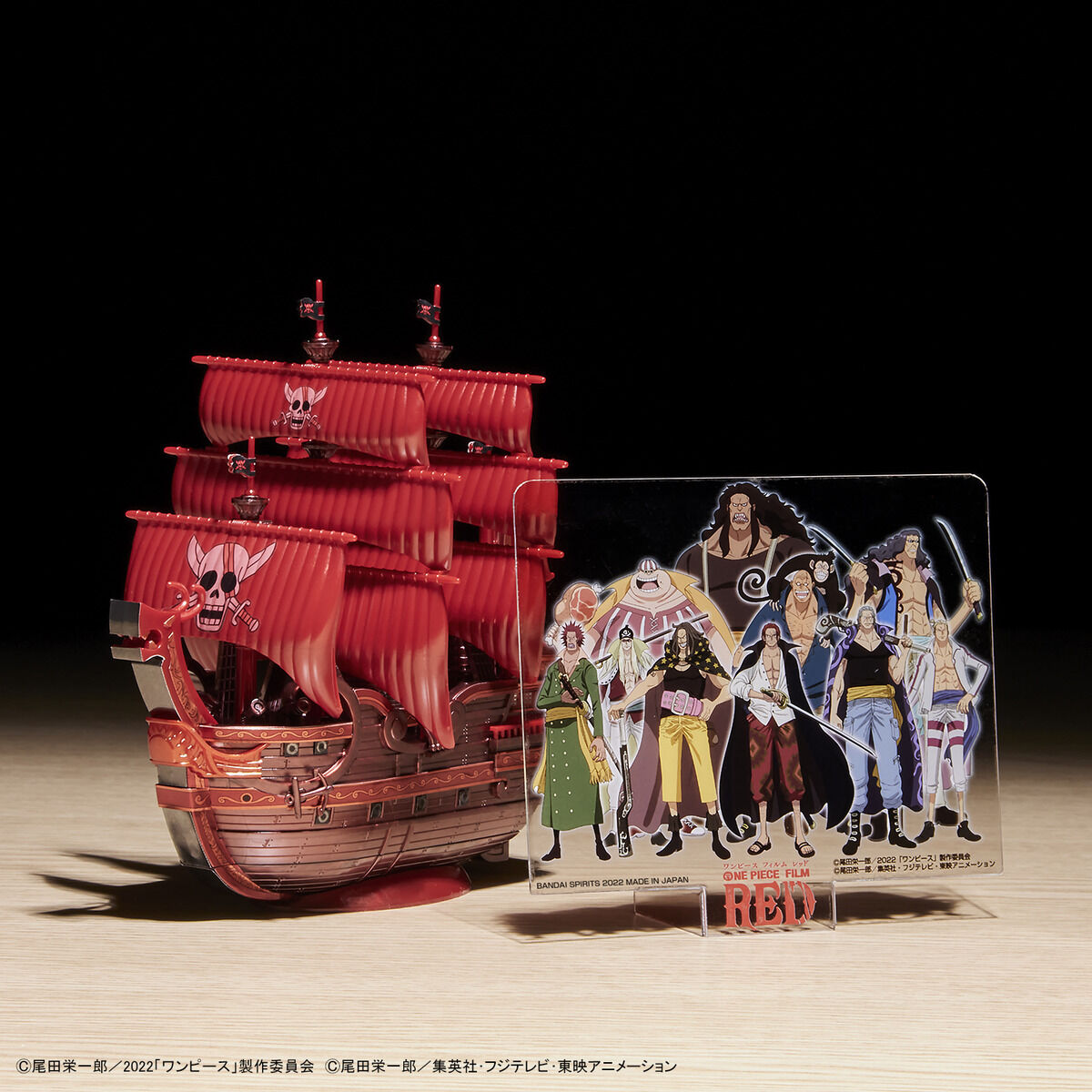 One Piece - Red Force - RED FILM Special - Grand Ship Collection Model Kit (Bandai), Metallic red color scheme inspired by the movie "ONE PIECE FILM RED", character plates of the Red Hair Pirates included, display base and ocean wave effects for added realism, foil and marking stickers included, released by Nippon Figures