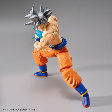 Dragon Ball - Ultra Instinct Goku - Figure-rise Standard Model Kit (Bandai), Featuring Son Goku in his ultimate form "Ultra Instinct" with torn gi, silver hair, and intense facial expressions, includes various parts for customization, from Nippon Figures