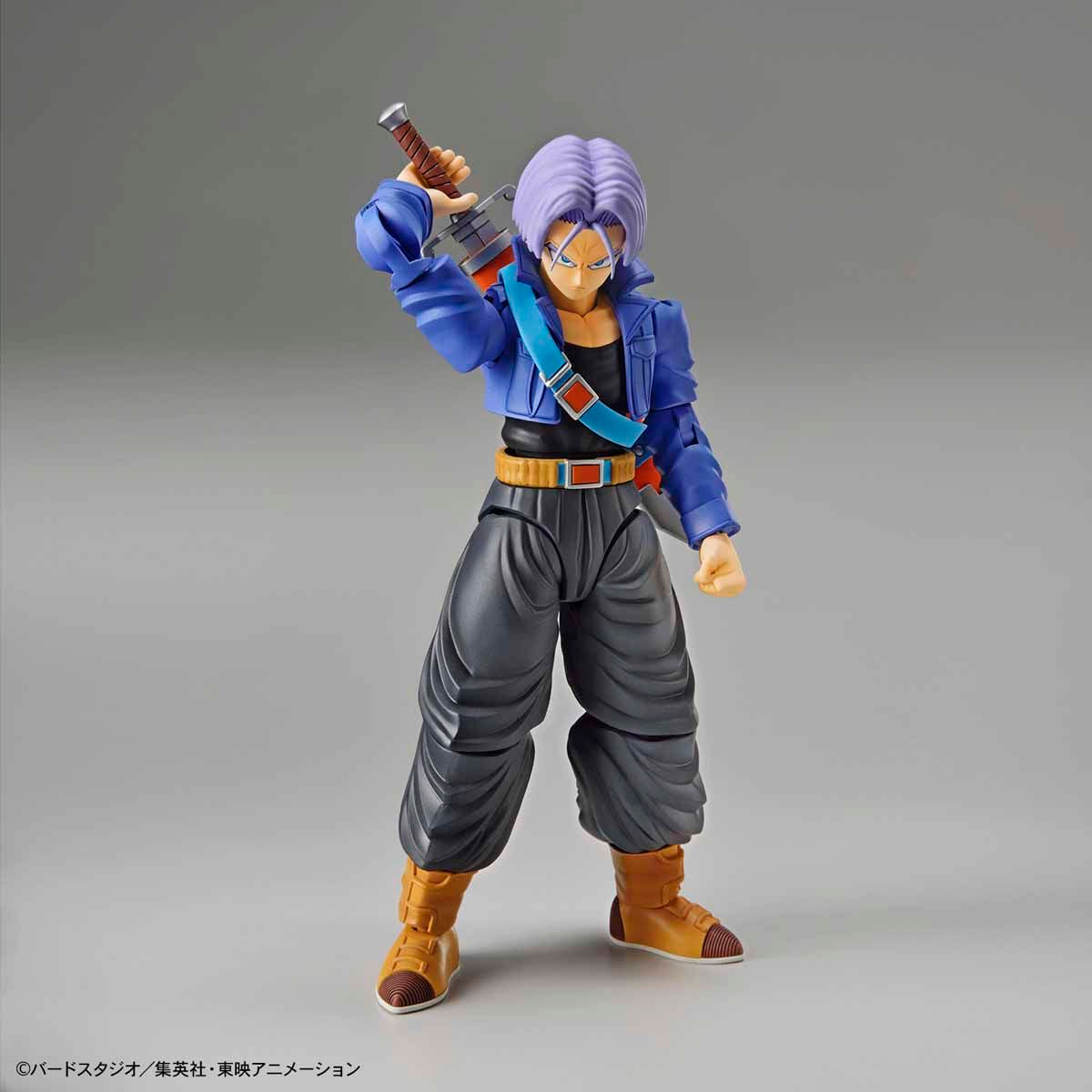 Dragon Ball - Super Saiyan Trunks - Figure-rise Standard Model Kit, Includes two head parts for Trunks in normal and Super Saiyan states, effect parts for Burning Attack and Shining Slash, iconic sword, and various hand parts. Compatible with Figure-rise Mechanics Trunks' Time Machine. From Bandai. Available at Nippon Figures.
