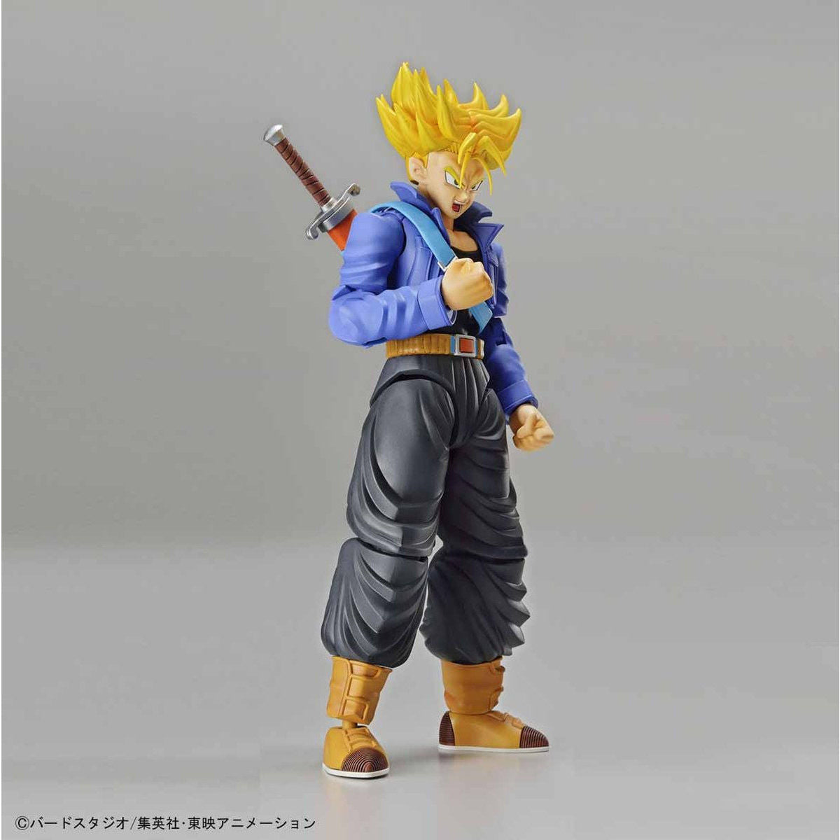 Dragon Ball - Super Saiyan Trunks - Figure-rise Standard Model Kit, Includes two head parts for Trunks in normal and Super Saiyan states, effect parts for Burning Attack and Shining Slash, iconic sword, and various hand parts. Compatible with Figure-rise Mechanics Trunks' Time Machine. From Bandai. Available at Nippon Figures.