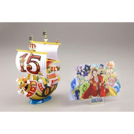 One Piece - Thousand Sunny (15th Year Anniversary) - Grand Ship Collection Model Kit, commemorating the 15th anniversary of the One Piece anime, includes character plate and sea surface effect, by Nippon Figures.